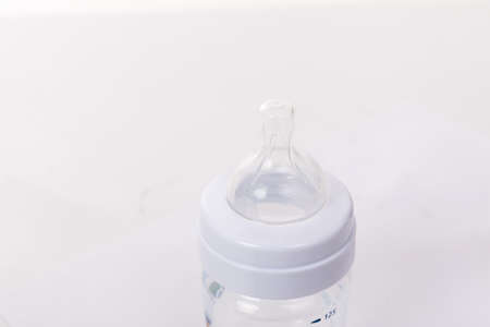 empty plastic bottle with a nipple for feeding an infant with breast milk or formula