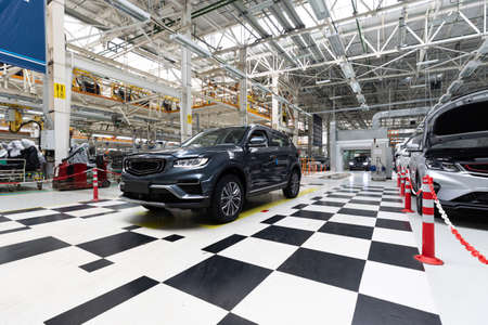 Modern car assembly plant. Auto industry. Interior of a high-tech factory, modern production of...