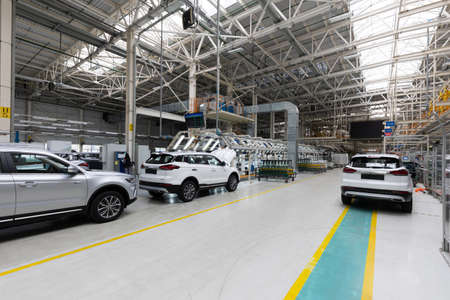 Automobile production line. Modern car assembly plant. Interior of a high-tech factory, manufacturing.の写真素材
