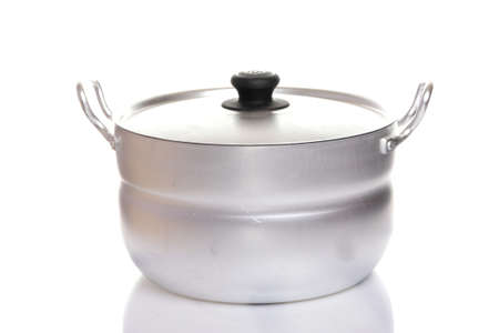 camping aluminum pan with handles and lid on a white isolated backgroundの写真素材