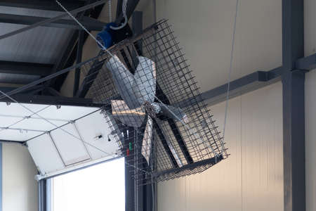large industrial fan for airing on a modern dairy farm