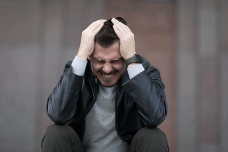 portrait of a middle-aged man with post-traumatic stress disorderの写真素材