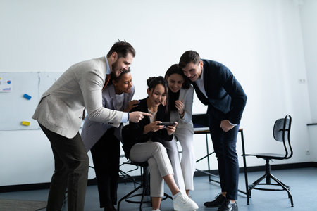 Cheerful startup business team rejoicing success at officeの写真素材