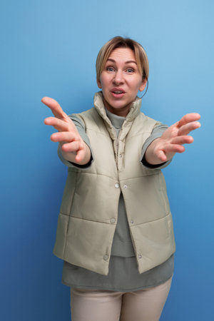 shocked 30 year old blond woman in casual clothes with emotions on her face