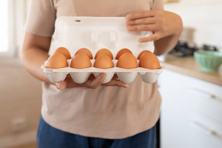 close-up of chicken eggs in a tray
