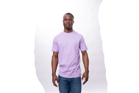 young american man with short haircut wearing a basic light purple t-shirt with space for printing on textilesの写真素材