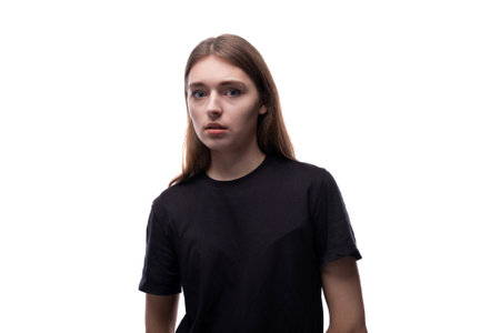 Headshot portrait of model looking Caucasian teenage girl wearing black t-shirt