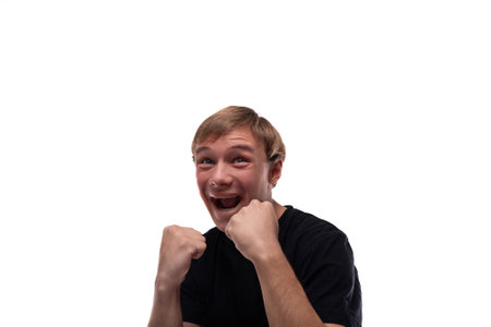 Satisfied Caucasian fair-haired teenager guy is happy