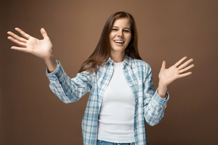 Cute brown-haired young woman wearing a green turtleneckの写真素材