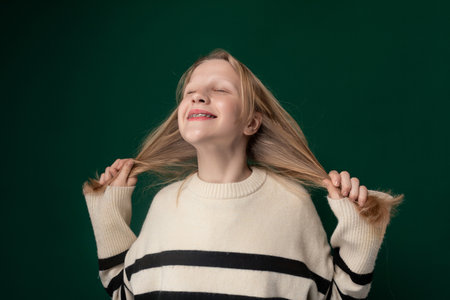 Smiling Young Girl With Blonde Hairの写真素材