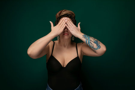 Woman Covering Her Eyes With Handsの写真素材