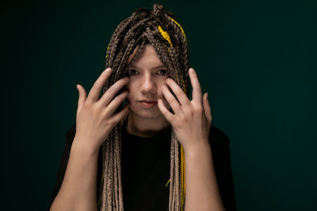 Woman With Dreadlocks Covering Her Face