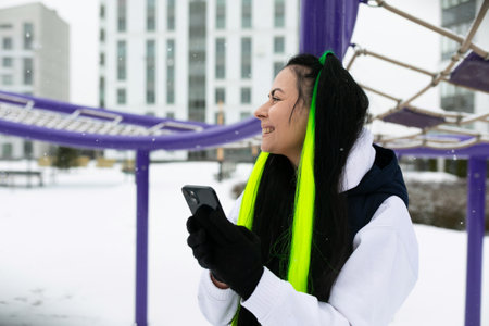 Woman Wearing Scarf Holding Cell Phone