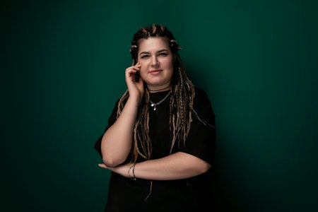 Woman With Dreadlocks Talking on Cell Phone