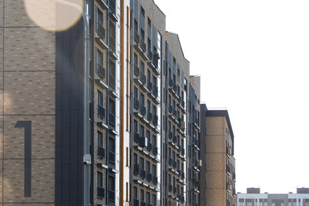 High-rise apartment buildings in a residential area with a view of modern architecture and urban livingの写真素材
