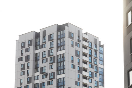 High-rise apartment buildings in a modern residential area highlighting rental opportunities and...