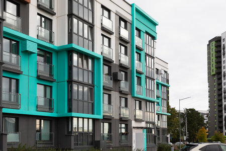 Modern high-rise apartment buildings in a residential area showcasing rental options and property insurance opportunitiesの写真素材