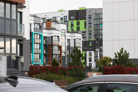 Modern high-rise apartment buildings in a residential area showcasing rental opportunities and property investments in an urban environmentの写真素材