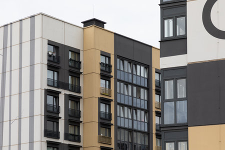 Modern high-rise apartment buildings in a residential area showcasing various rental and mortgage options for potential residentsの写真素材