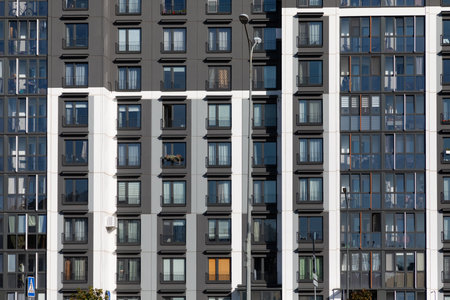 High-rise apartment buildings in a residential area showcasing modern architecture and urban living...