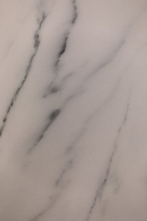 Elegant marble surface with subtle veining showcasing natural beauty and texture for interior design...