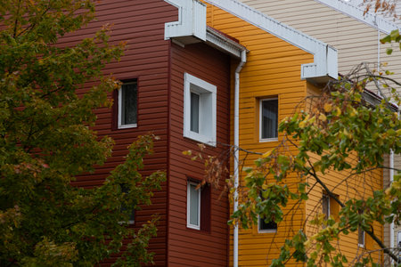 High-rise apartment buildings in a residential area highlighting rental and mortgage opportunities with property insurance considerationsの写真素材