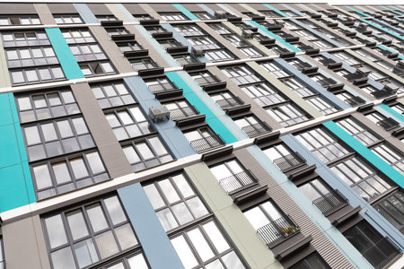 Colorful high-rise apartment buildings showcasing residential living options in a modern urban areaの写真素材