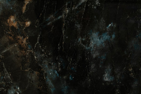 Dark marble texture with unique patterns and colors for background or design purposesの写真素材