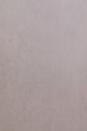 Smooth grey wall texture with subtle variations and a minimalistic aesthetic perfect for background applicationsの写真素材