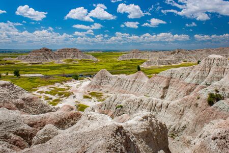 Broad view of the South Dakota badlands with blue cloudy skyの写真素材