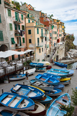 Rowboats at the Riomaggiore Harbor in Cinque Terre Italyの写真素材