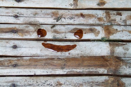 Smile face on the old bamboo bedの写真素材