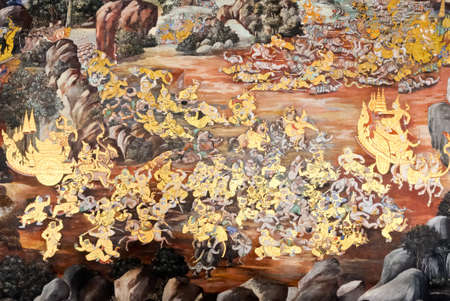 Traditional Thai painting on the wall of grand temple in the royal palace,Thailand.の写真素材