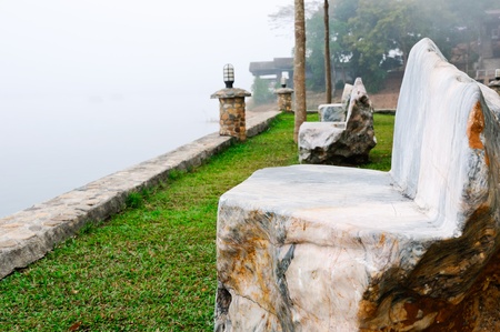 Stone bench of the natural resort in the early morning.のeditorial素材