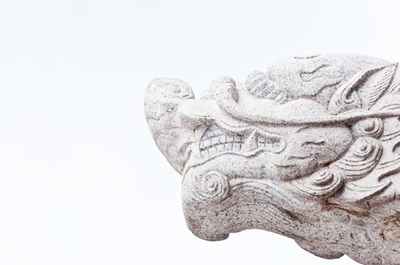 White dragon head statue which made ââof marble  is adorned inside a Chinese temple.の写真素材