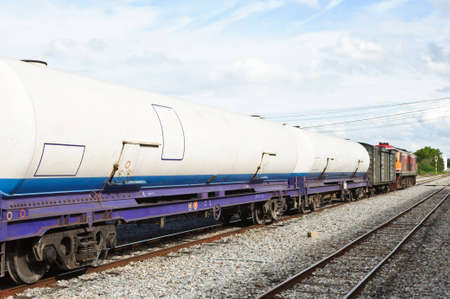 Bogie gas tanker in freight train on station. の写真素材