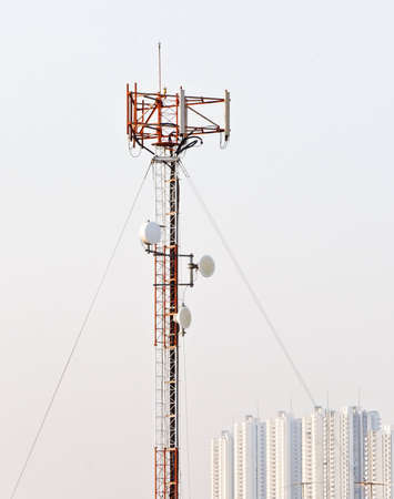 Phone antenna pole stand in the city at evening の写真素材