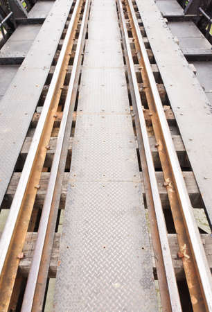 Old railway line on the metal bridge.