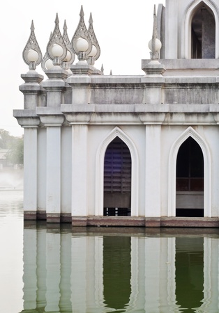 Modern thai pagoda on the lake of university の写真素材