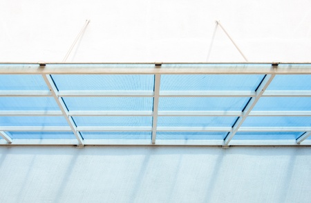 Modern plastic canopy on the building wall の写真素材