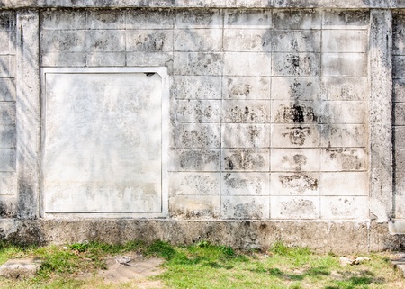 Exit door on the white wall of the urban park の写真素材