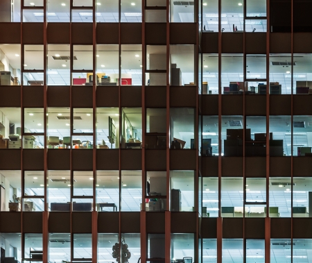 Modern office building in urban city at the night のeditorial素材