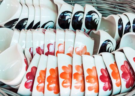 White ceramics dish in the basket for use in restaurant の写真素材