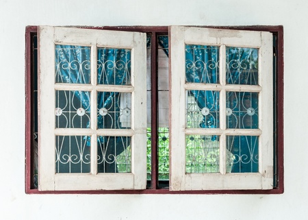 Old wooden window of the farmer house in rural village 