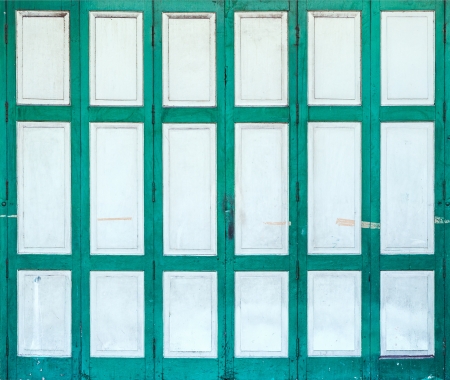 Wooden folding doors of the old building in china town の写真素材