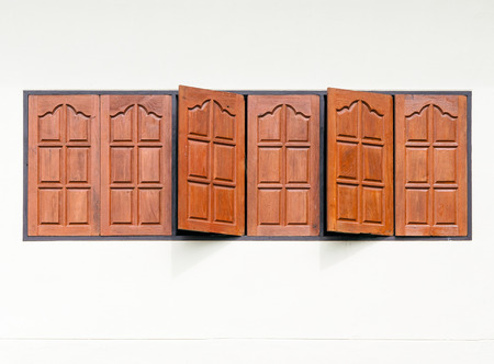 Wooden window of Thai temple were opened.の写真素材