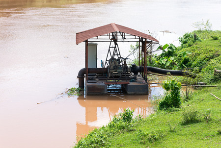 Small float pump for rural waterworks in Thailand.の写真素材
