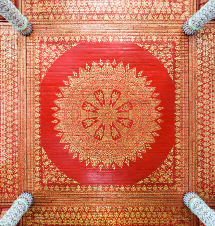 Traditional Thai ceiling on the top of Thai temple.の写真素材