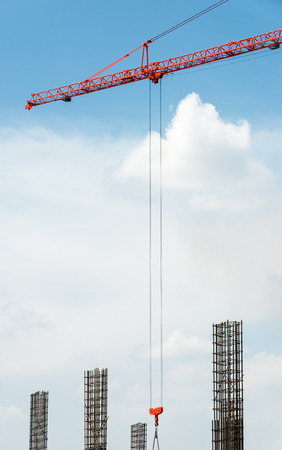 Steel sling from high crane in the construction site.の写真素材