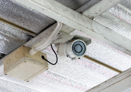 Small cctv with control box on the ceiling house.